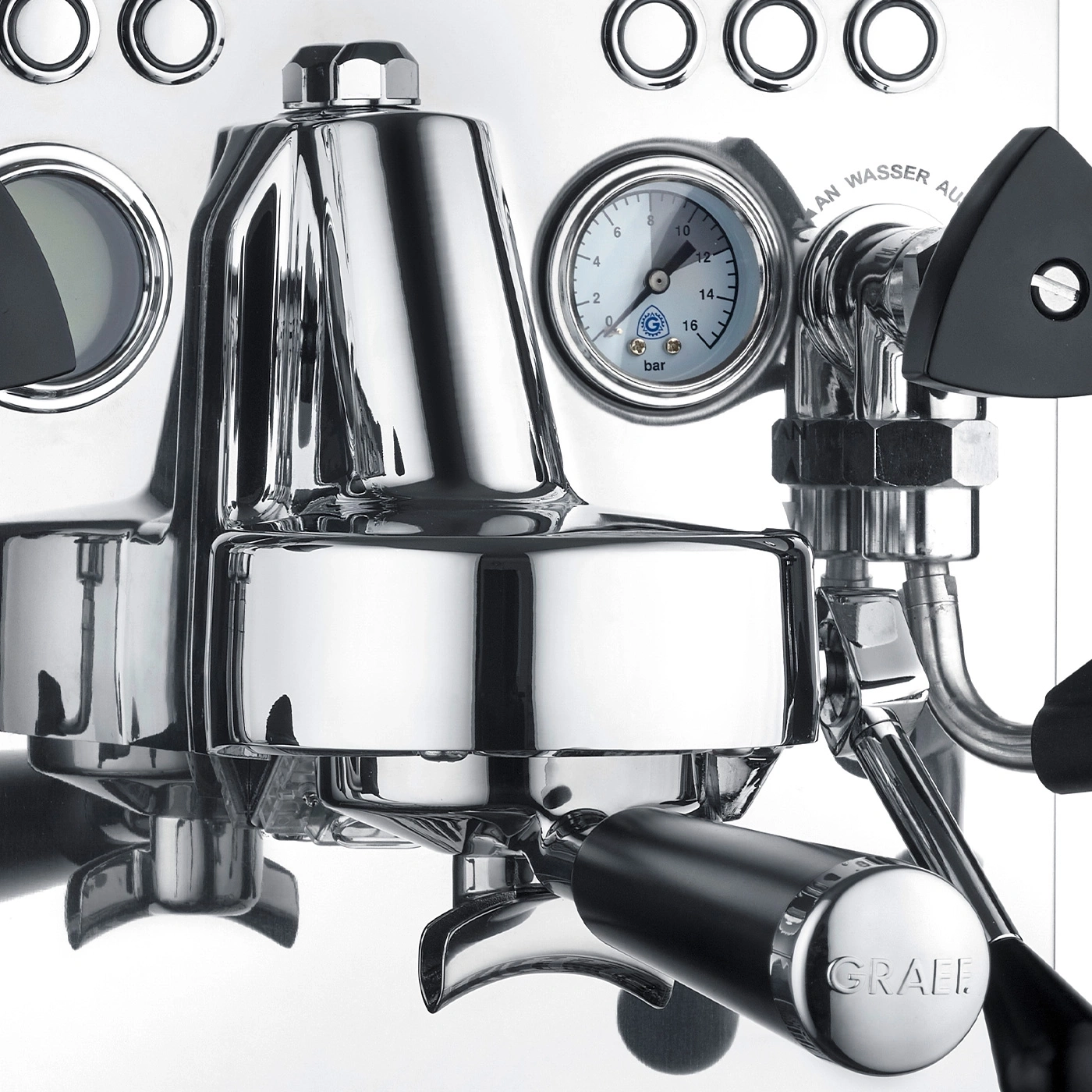 Close-up of a shiny espresso machine with a pressure gauge and the GRAEF logo.