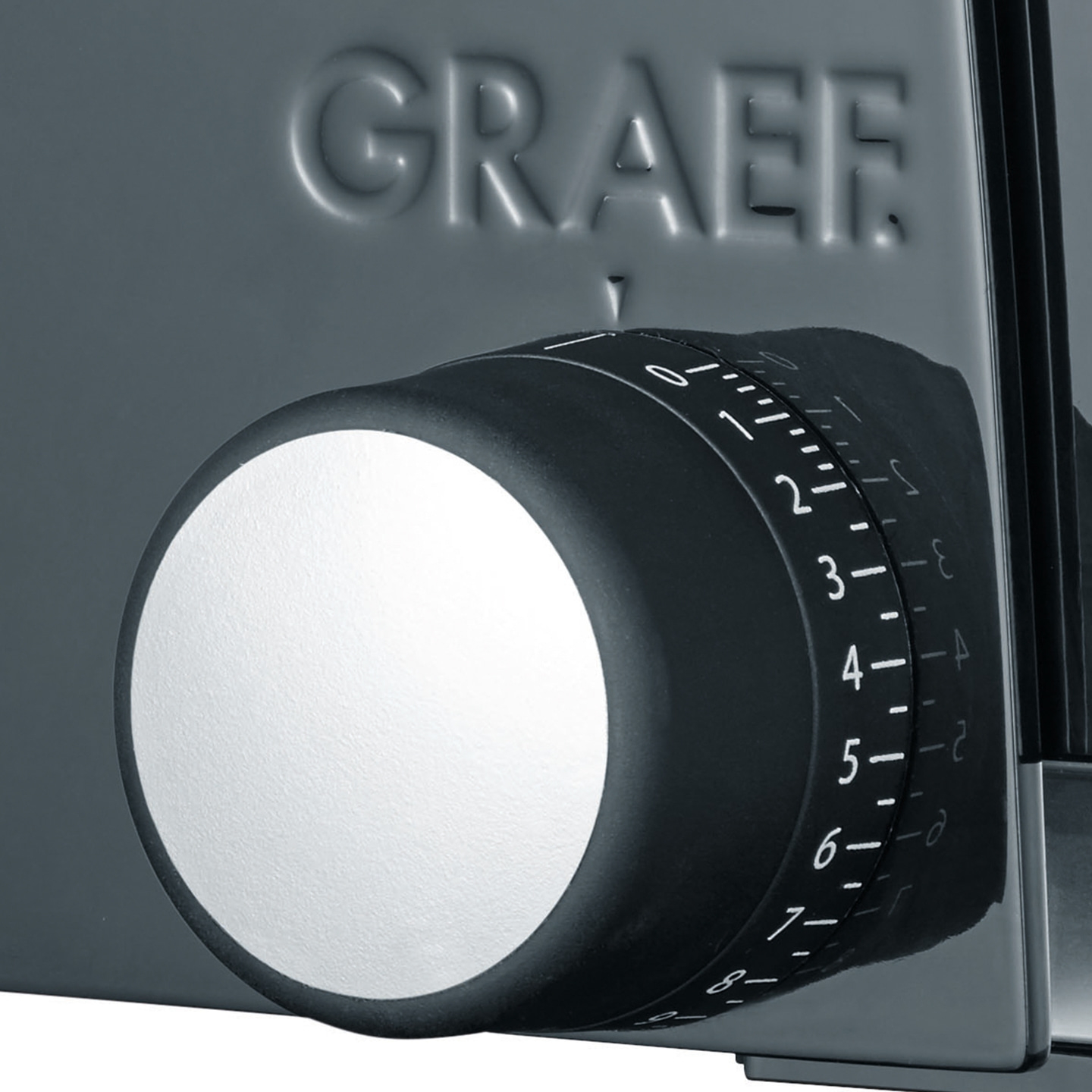 Graef appliance with a dial and scale for adjusting the thickness.