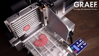 GRAEF slicer with salami slices, modern and efficient food preparation.