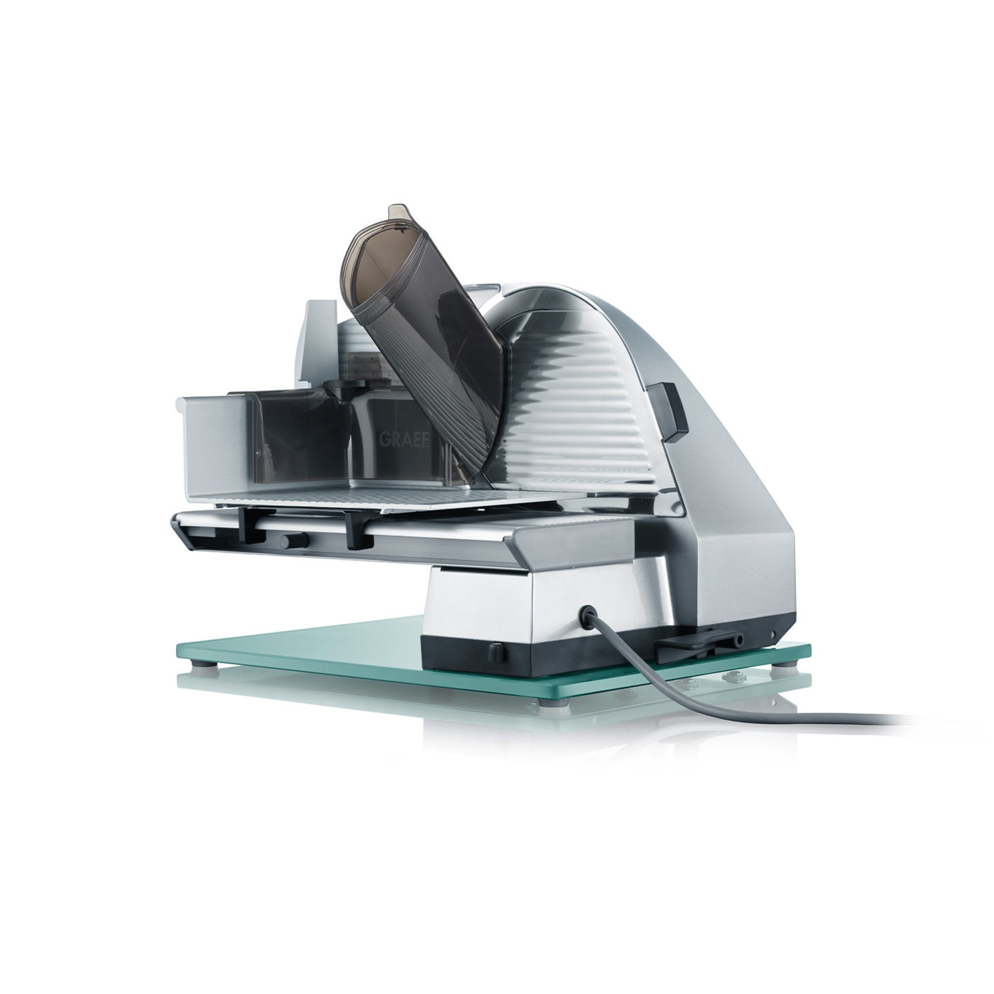 Graef Allesschneider, silber, elektrisch, mit Glasplatte, Detailaufnahme, isoliert