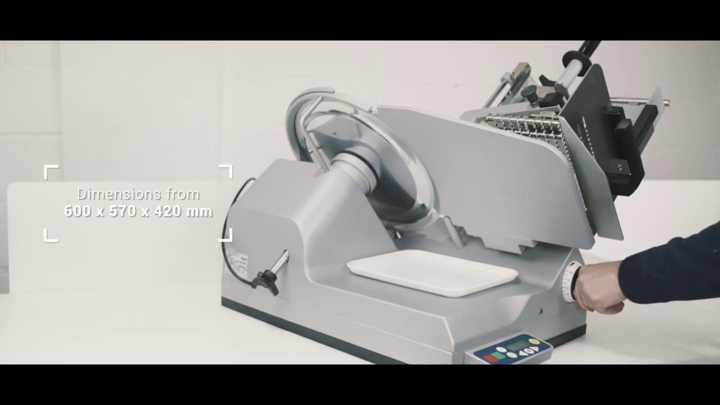 Fleischschneidemaschine mit Abmessungen von 600 x 570 x 420 mm, graue Farbe.