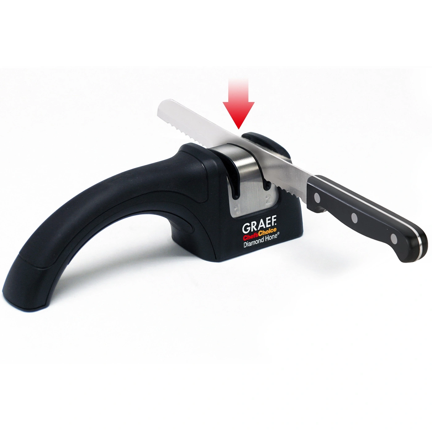 Knife being sharpened with a sharpener. Black handle, red arrow, white background. Graff Chefs Choice.