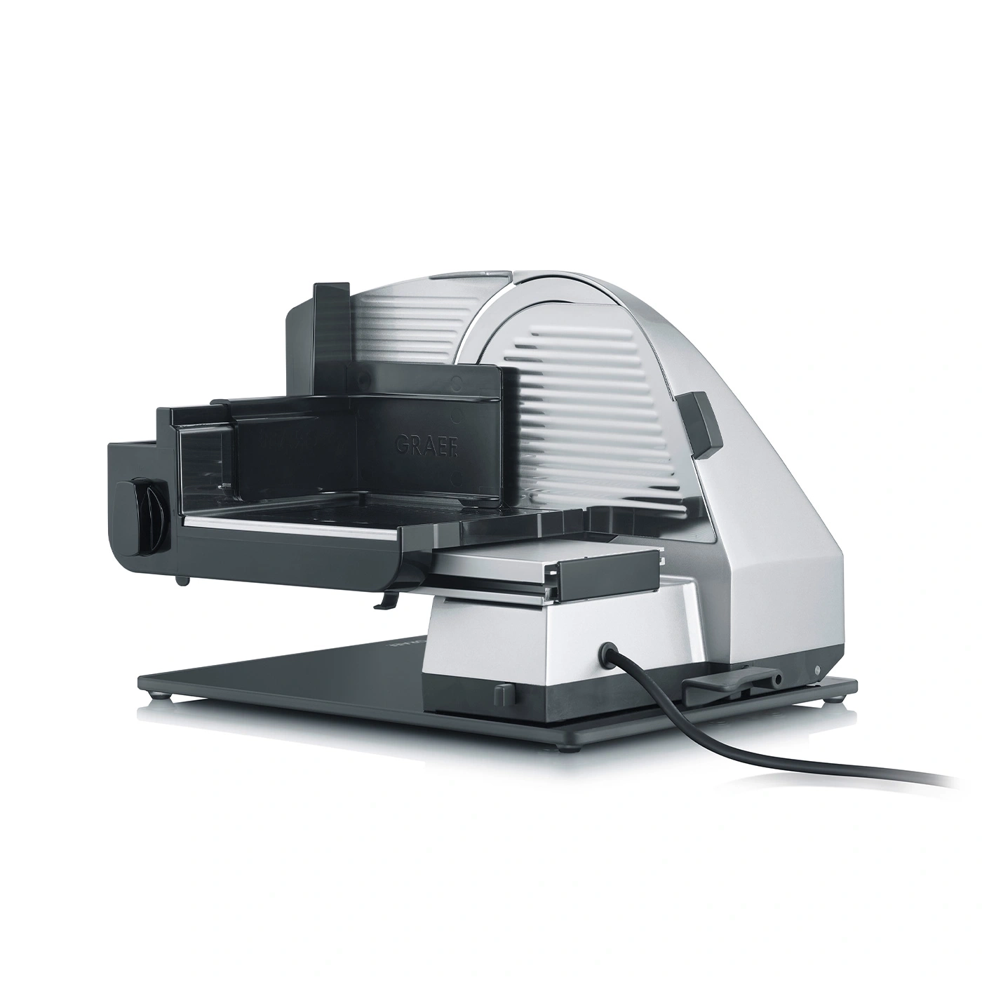 Silver and black Graef slicer on white background, with power cord and brand name