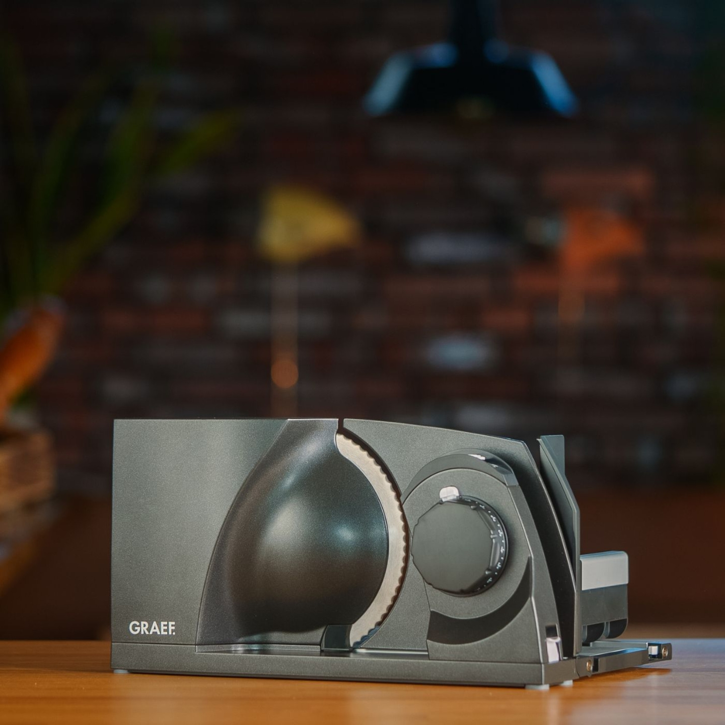 Graef slicer on wooden surface, gray color, kitchen appliance, close-up shot