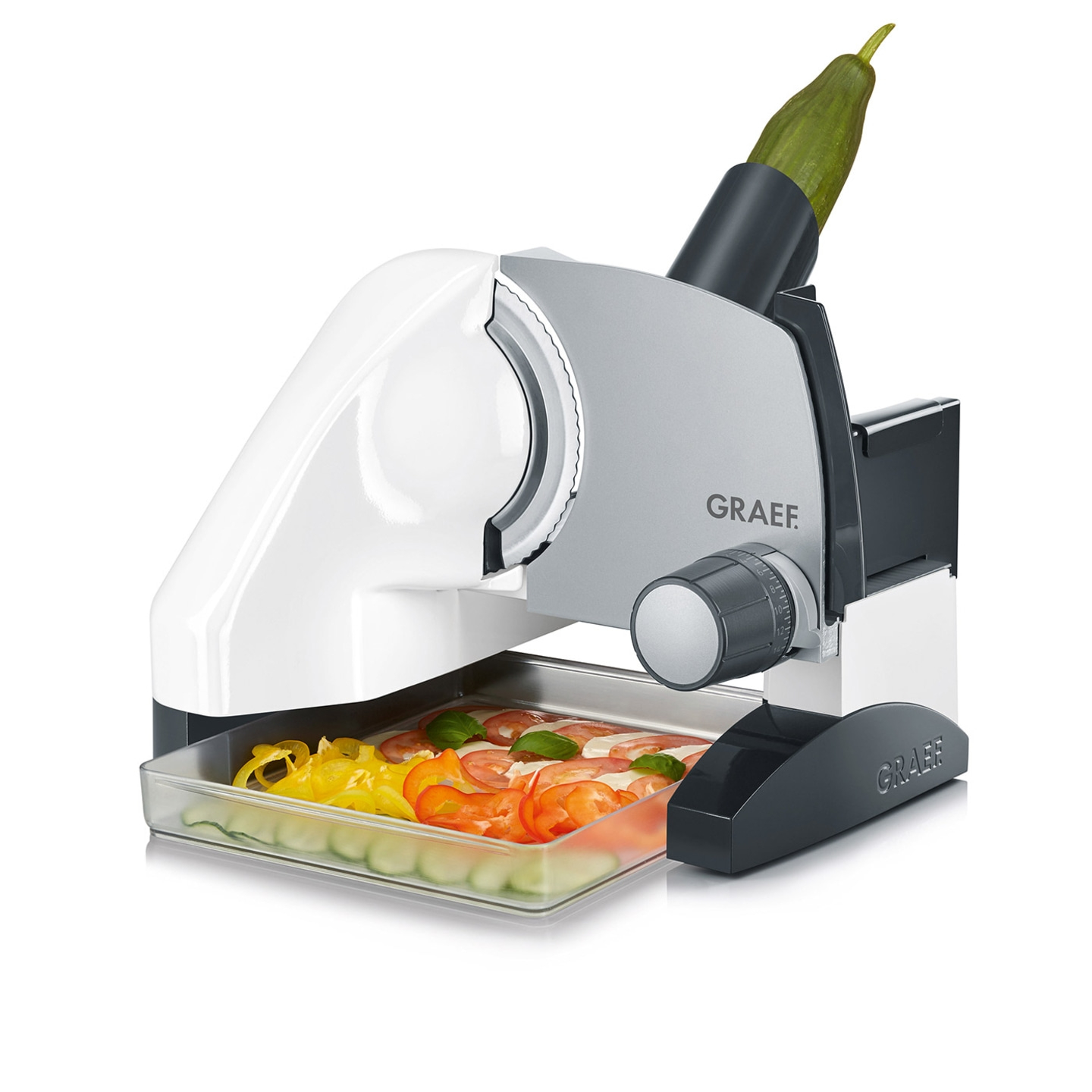 Graef Allesschneider mit Gemüse und Tomaten in der Auffangschale