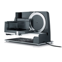 Black electric food slicer with blade and cutting board, Graef logo visible.