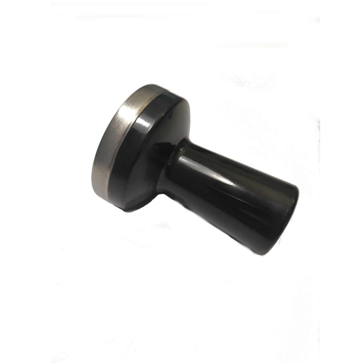 Black coffee tamper on white background, shiny and clean, angled view.