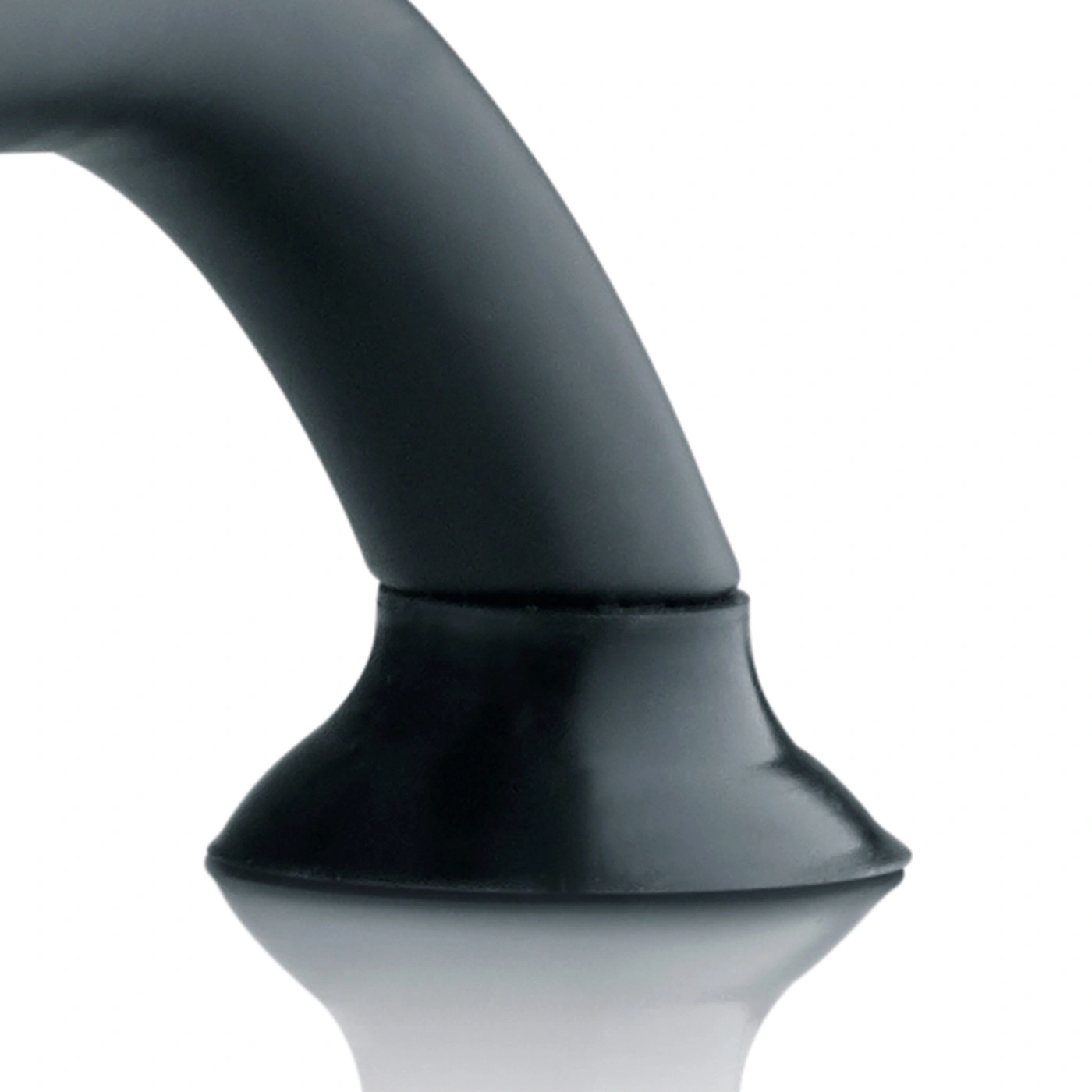 Black curved object with reflective surface, isolated on white background