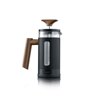 French press coffee maker with wooden handle and lid, black body, glass container.