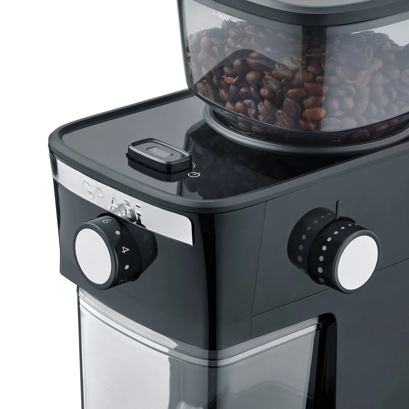 Kaffeemühle mit Bohnen und Einstellrädern, Nahaufnahme, schwarz